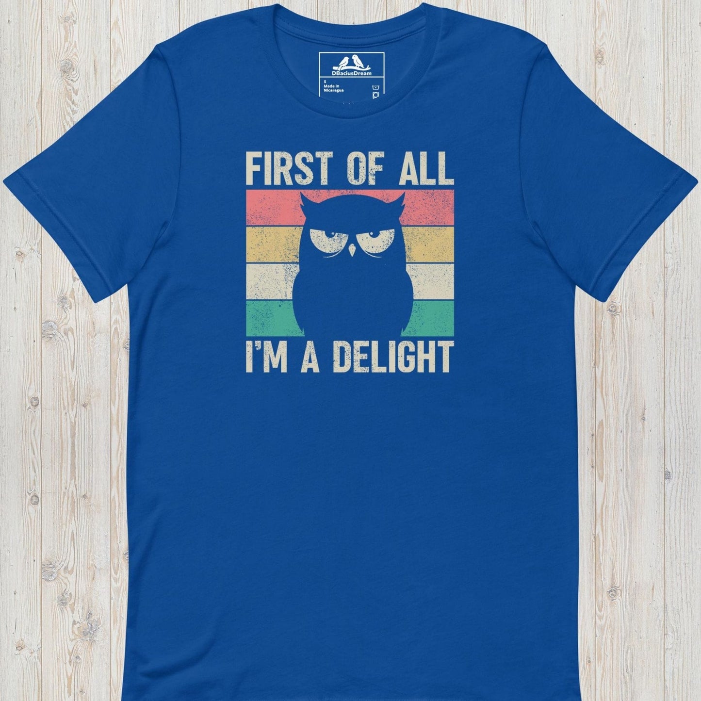 Blue funny owl t-shirt with vintage grumpy owl graphic and text "First Of All, I'm A Delight"