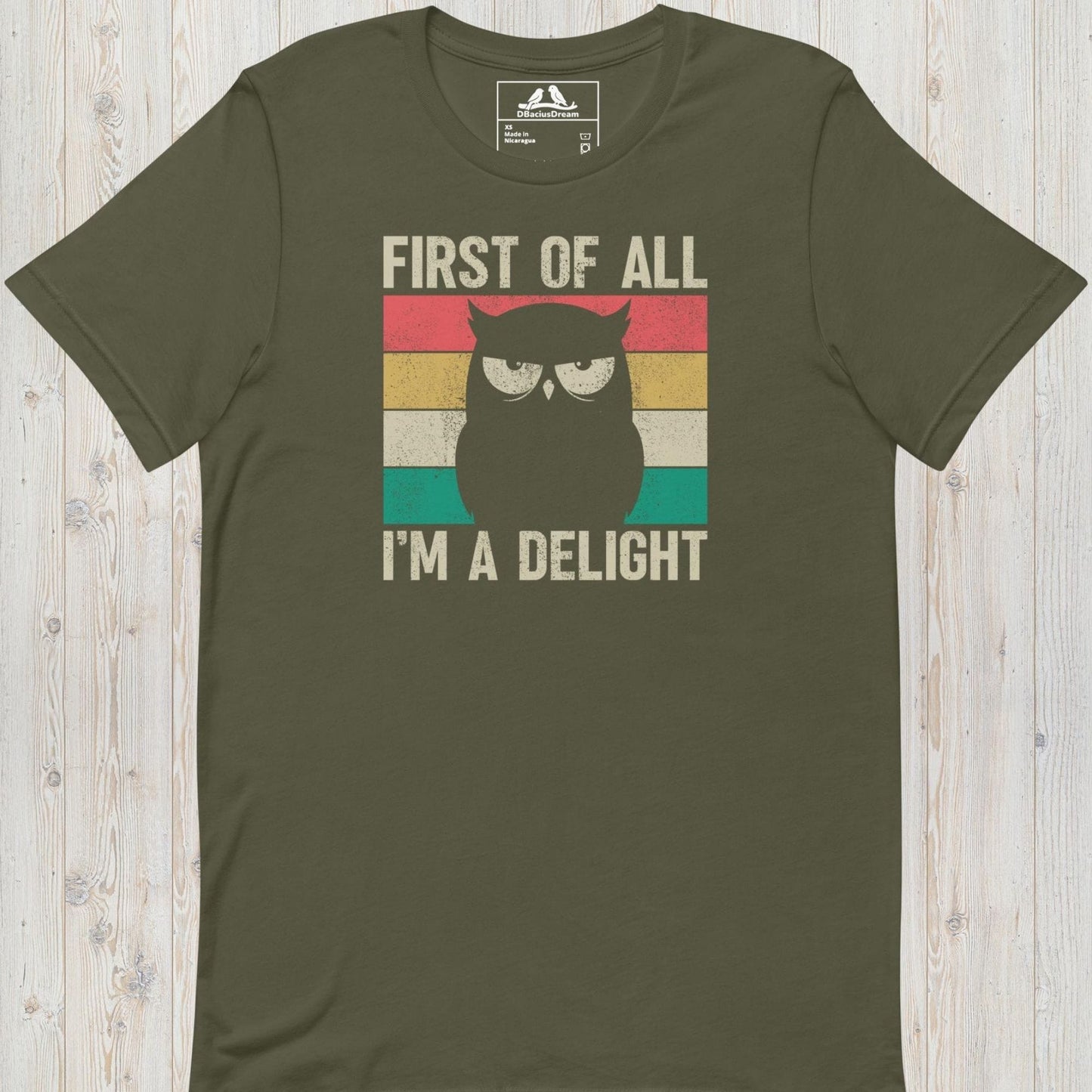 Olive green funny owl t-shirt with vintage grumpy owl graphic and text "First Of All, I'm A Delight"