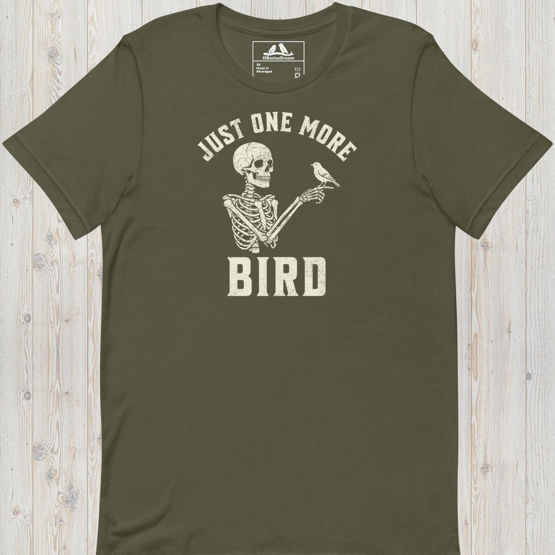 Olive green just one more bird t-shirt with a skeleton birder graphic and the quote "Just One More Bird"