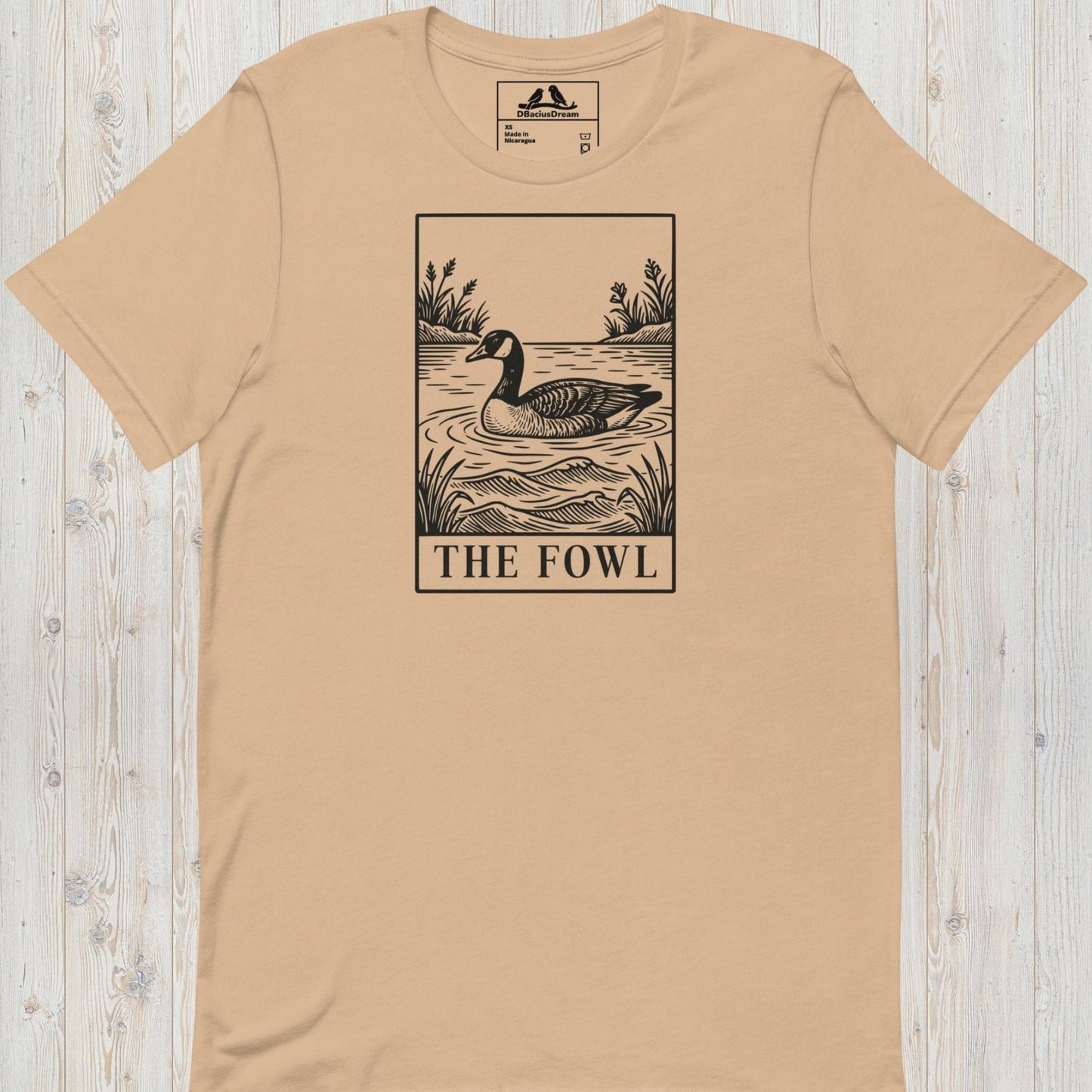 Beige funny goose t-shirt with a black graphic of a goose and the text ”The Fowl”