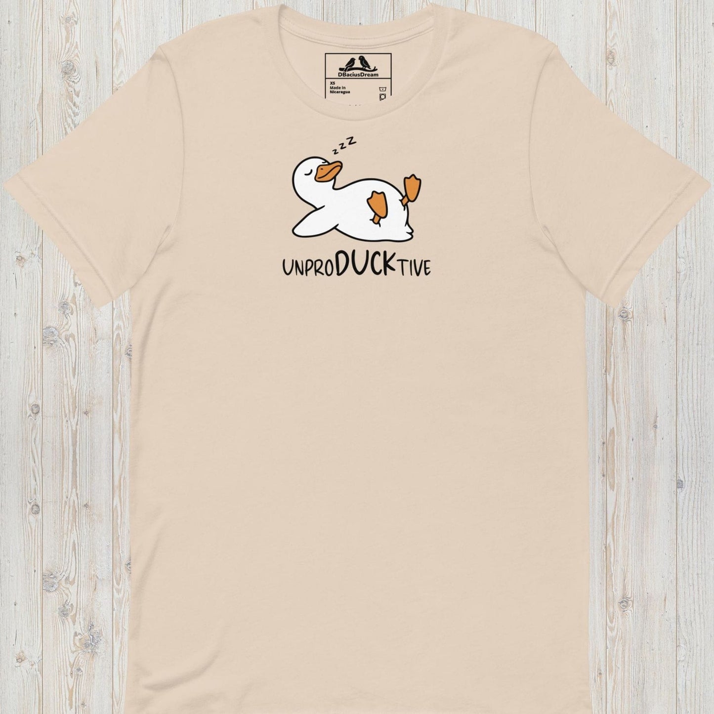 Light Beige funny duck t-shirt featuring a lazy duck lying on its back and the text "UnproDUCKtive"