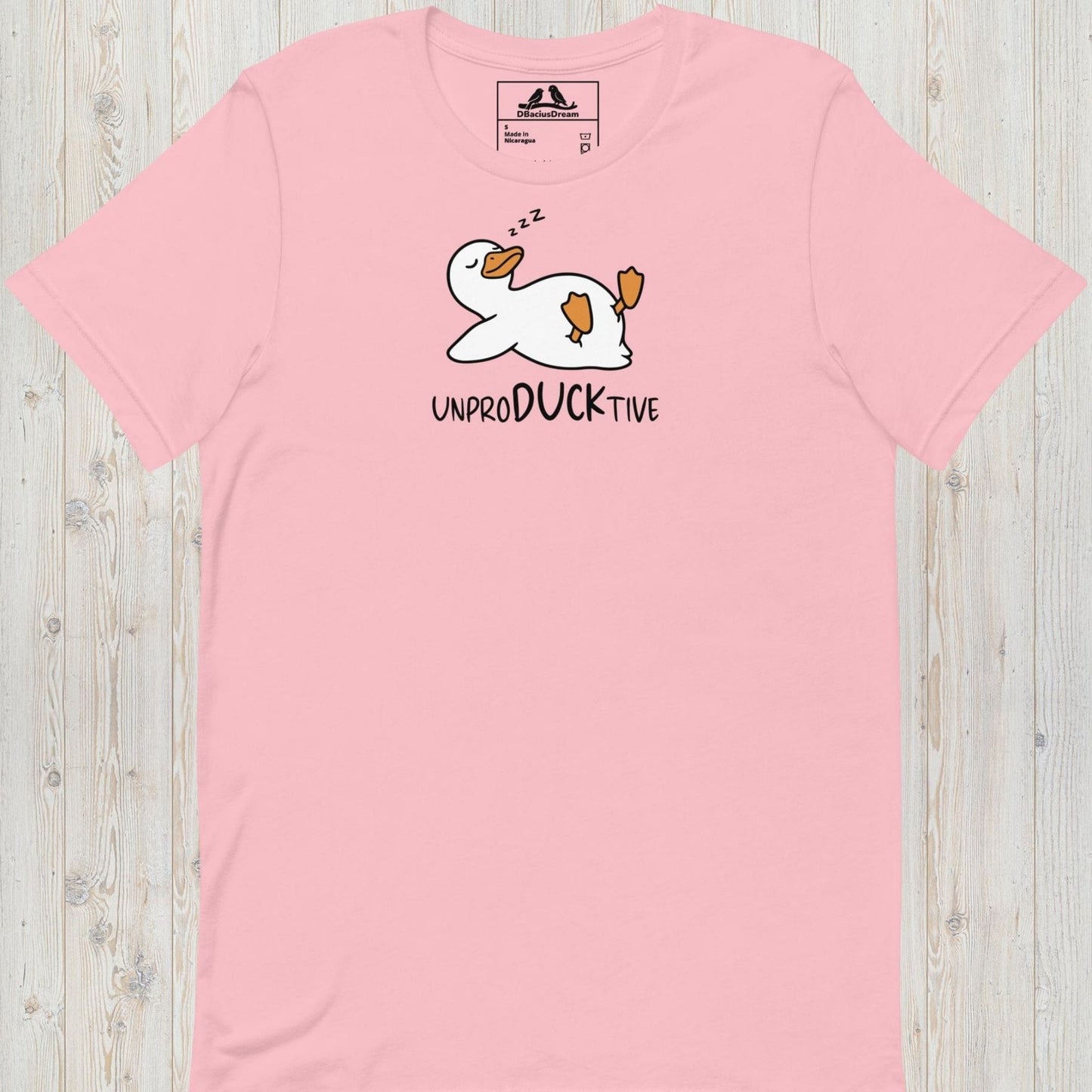 Pink funny duck t-shirt featuring a lazy duck lying on its back and the text "UnproDUCKtive"