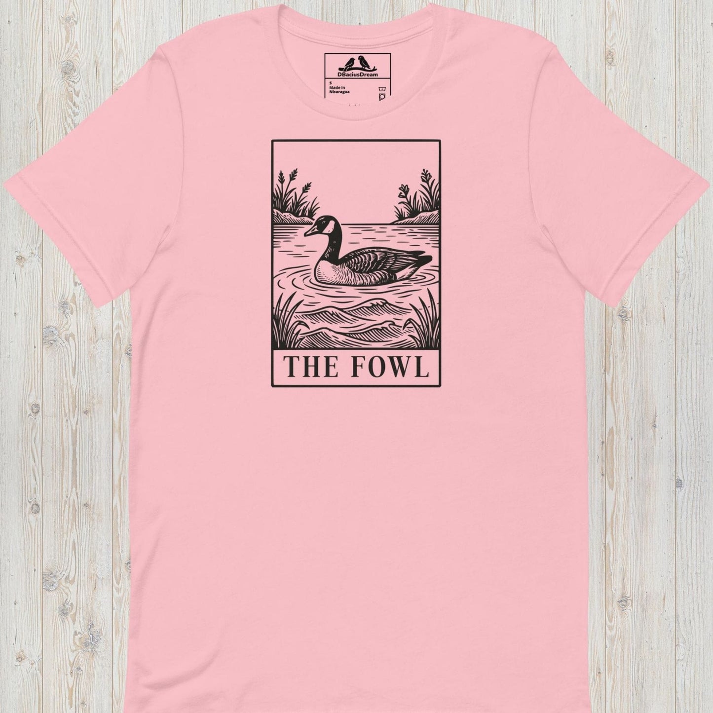 Pink funny goose t-shirt with a black graphic of a goose and the text ”The Fowl”