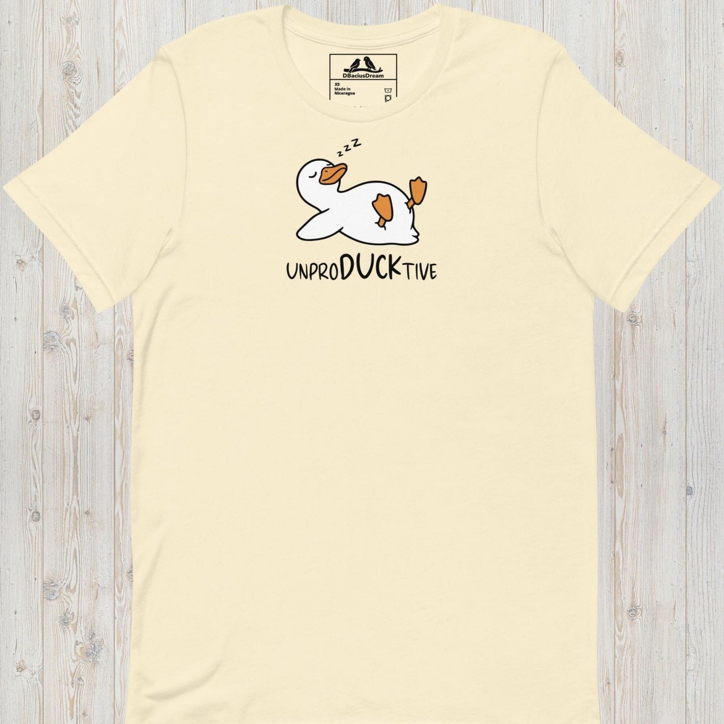 Cream funny duck t-shirt featuring a lazy duck lying on its back and the text "UnproDUCKtive"